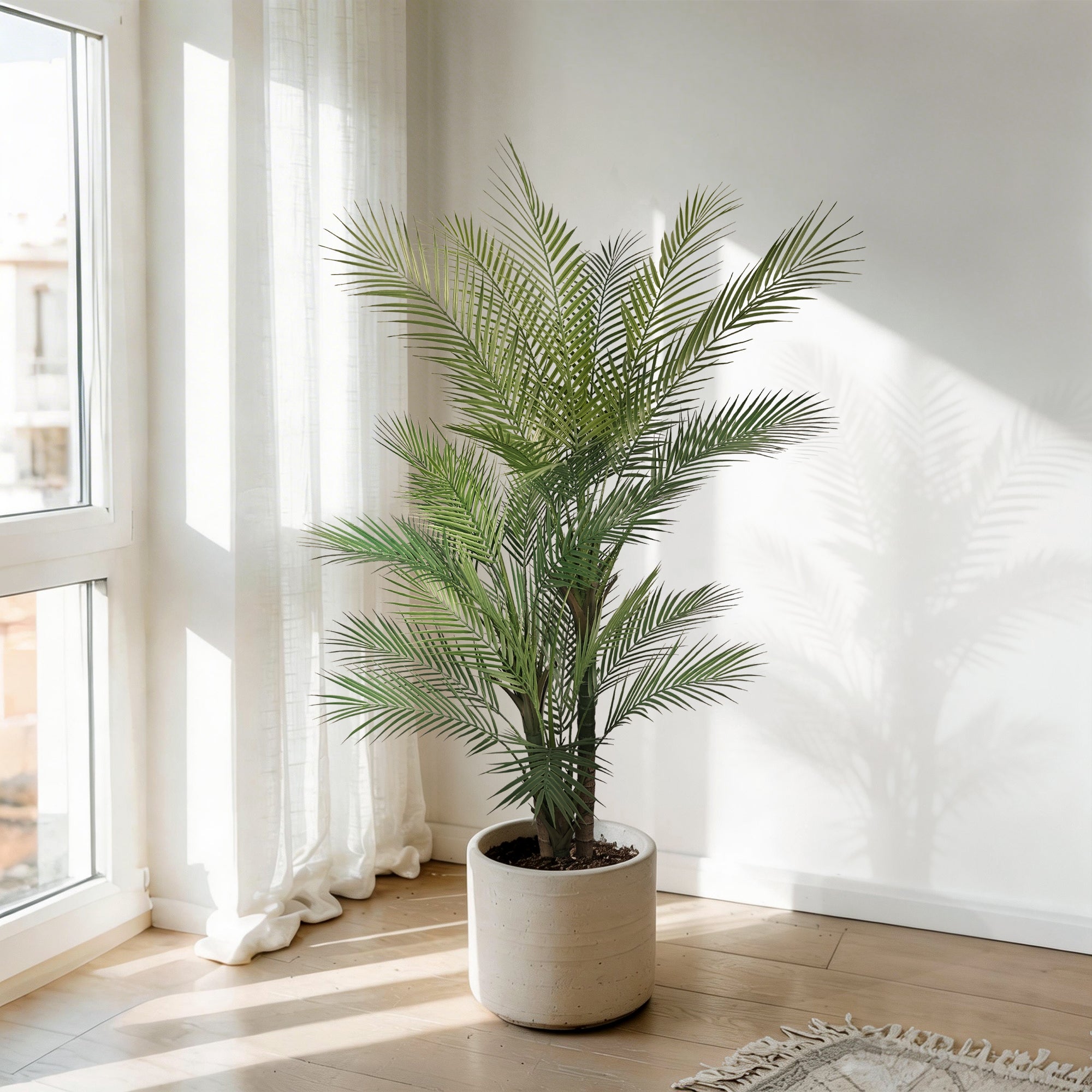 This artificial PE three-trunk palm tree features a triple-trunk design that makes it appear fuller from every angle, while its PE construction makes it more environmentally friendly.