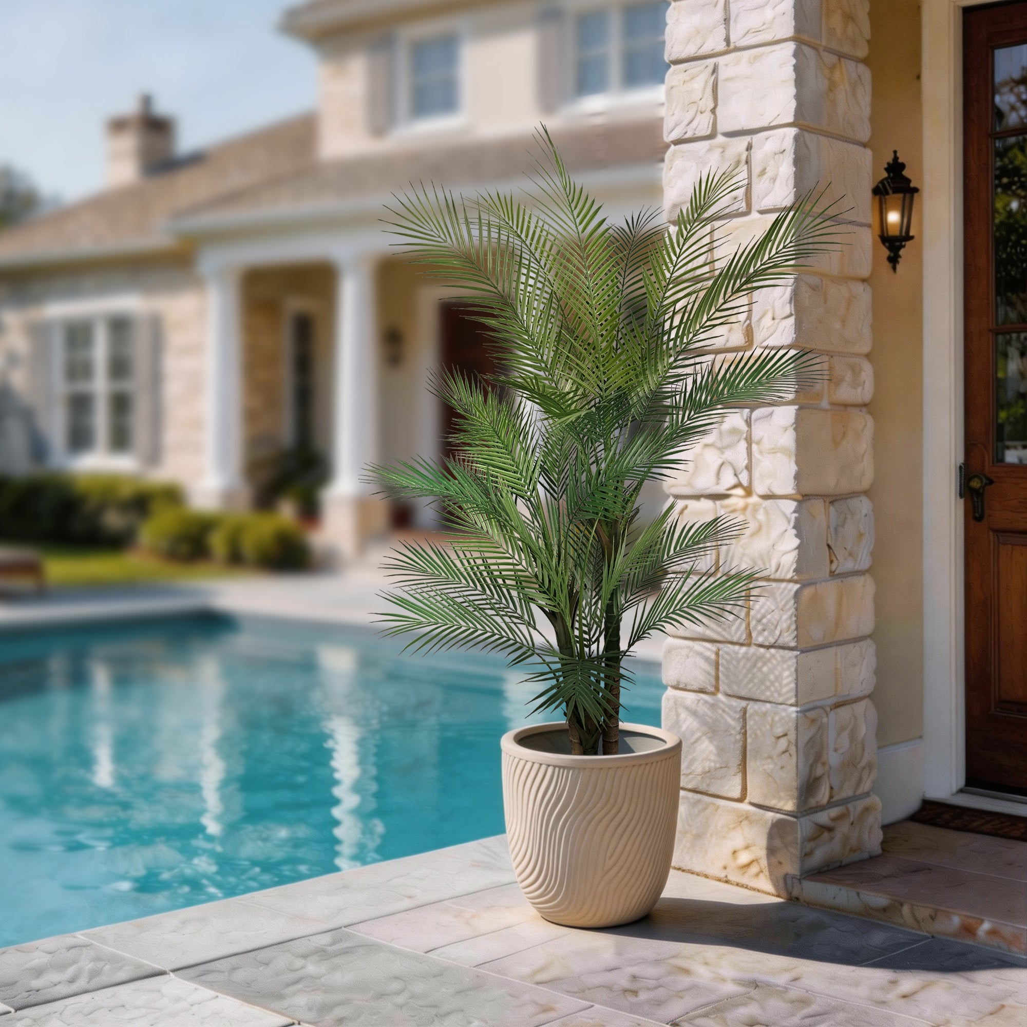 This artificial PE three-trunk palm tree features a triple-trunk design that makes it appear fuller from every angle, while its PE construction makes it more environmentally friendly.